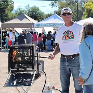 Roasting Chilies while you wait.  Corrales Grower's Market.  Various dates.