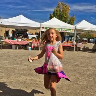 Happy customer running home with fresh yummy produce