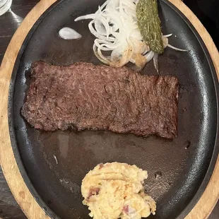 Sad portion of mashed potatoes, food was brought out freezing cold, the place was a disgusting dump with zero hygiene. Terrible!