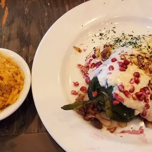 Served with orange rice, I have usually had it with white rice. Interesting.