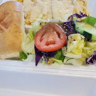 a meal in a styrofoam container