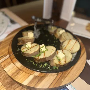 a plate of grilled potatoes