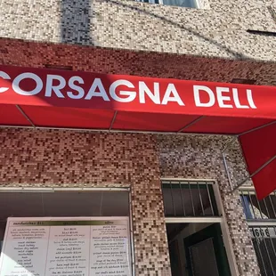 a red awning on a building