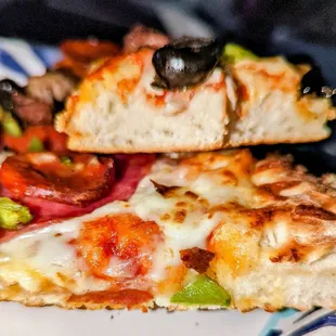 Another view of pizza sans sauce