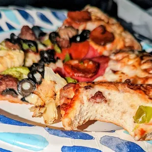 Almost sauceless slice of pizza