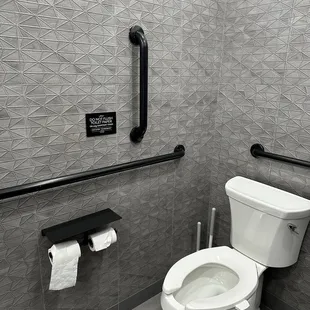 Restroom and phone holder