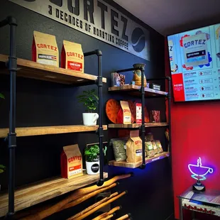 shelves of coffee beans and coffee beans