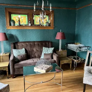 a living room with blue walls