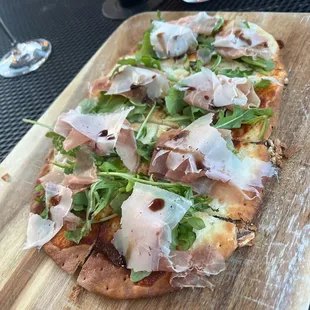 One of their featured flatbreads; prosciutto, arugula, honey....