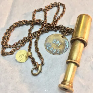This wonderfully hand-made steampunk mini telescope necklace is the perfect piece for anyone's jewelry collection. This piece, especially, w