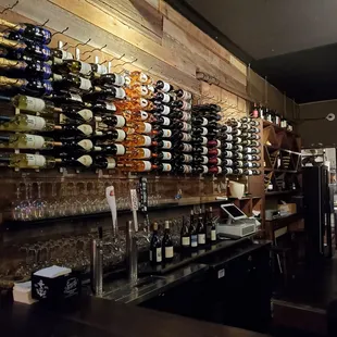 a wall of wine bottles