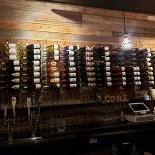 a wall of wine bottles
