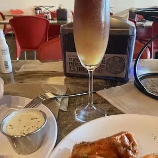 Try the wings and the Nostra Mimosa...