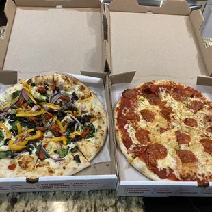 Veggie pizza and pepperoni &amp; pineapple
