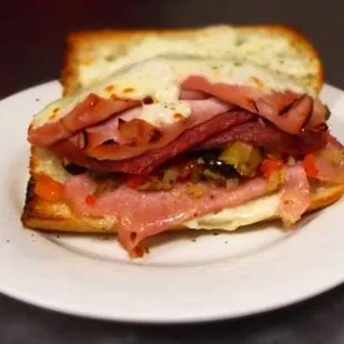 1/2 of Muffuletta Sandwich on our fresh baked bread.