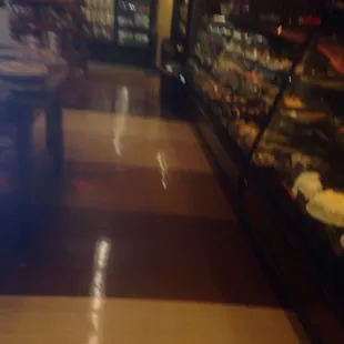 a blurry image of a grocery store