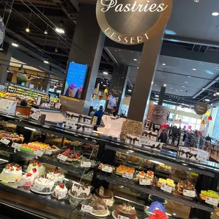 a display of cakes and pastries