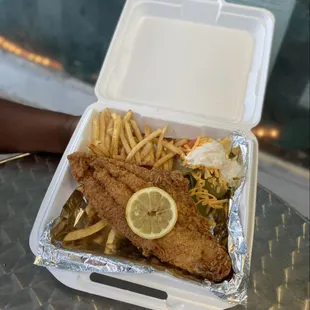 fish and fries in a container