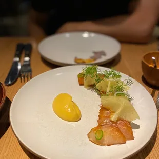 Cobia al pastor - really unique flavors! Pineapples and raw fish in a tortilla