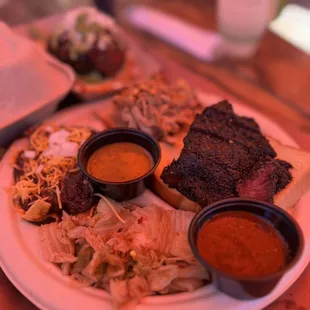 Beef cheek, pulled pork, kimchi and frito pie