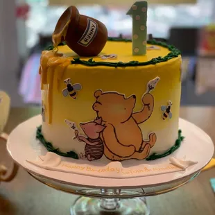 Winnie the Pooh and piglet 1st birthday cake.