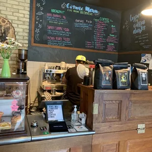 a bari serving a cup of coffee