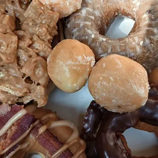 a variety of doughnuts in a box