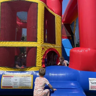 Jumper slide combo with basketball net inside
