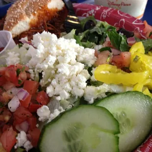 (From Bay 1)Greek Salad and pulled pork sandwich.