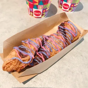 a doughnut with blue and pink icing
