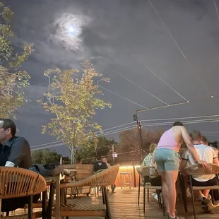 Growing moon sky from rooftop deck
