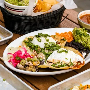 plates of mexican food on a table