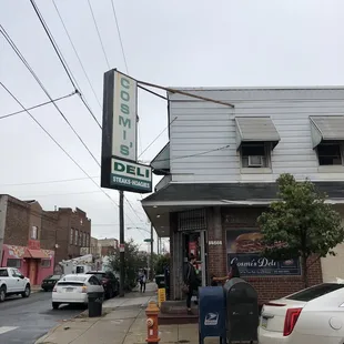 a car parked in front of a restaurant