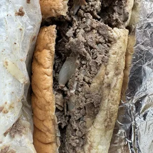 Cheesesteak with mushrooms, onions, and peppers