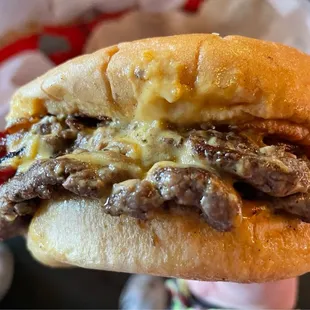 Double smash burger with vegan cheese and bacon