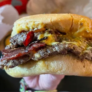 Double smash burger with vegan cheese and bacon
