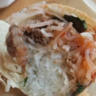 Sad excuse for a pho burrito... this was $9.  There is the thinnest slice of meat they could find in here... cheap cheap cheap...