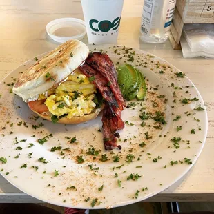 Bagel with scrambled eggs and bacon (add Avocado)