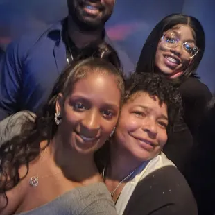 a group of people posing for a picture