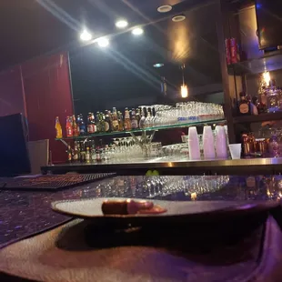 a plate of food on a bar counter