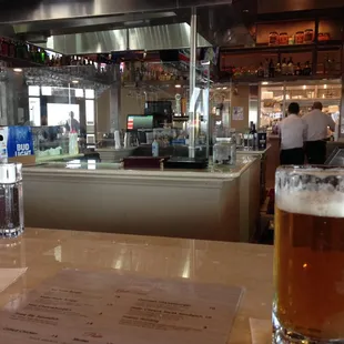 bar with grill station in the center