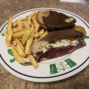 New York sandwich pastrami corn beef Russian dressing and coleslaw on marble rye!