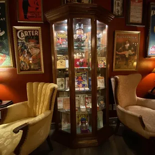 two chairs and a curiograph