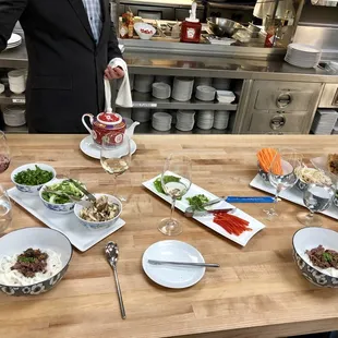 Creating our beef pho soup - chef's tasting