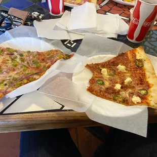 Pizza by the slice, huge, so good!