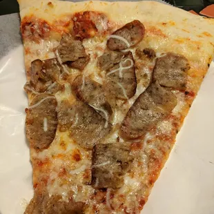 One of Cosmo's many offerings, a slice of sausage!