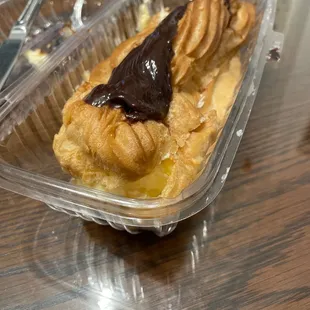 a pastry in a plastic container