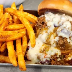 a chili cheeseburger and french fries
