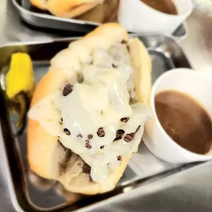 two hot dogs with melted cheese