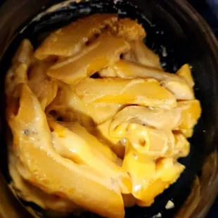 a close up of pasta in a crock pot